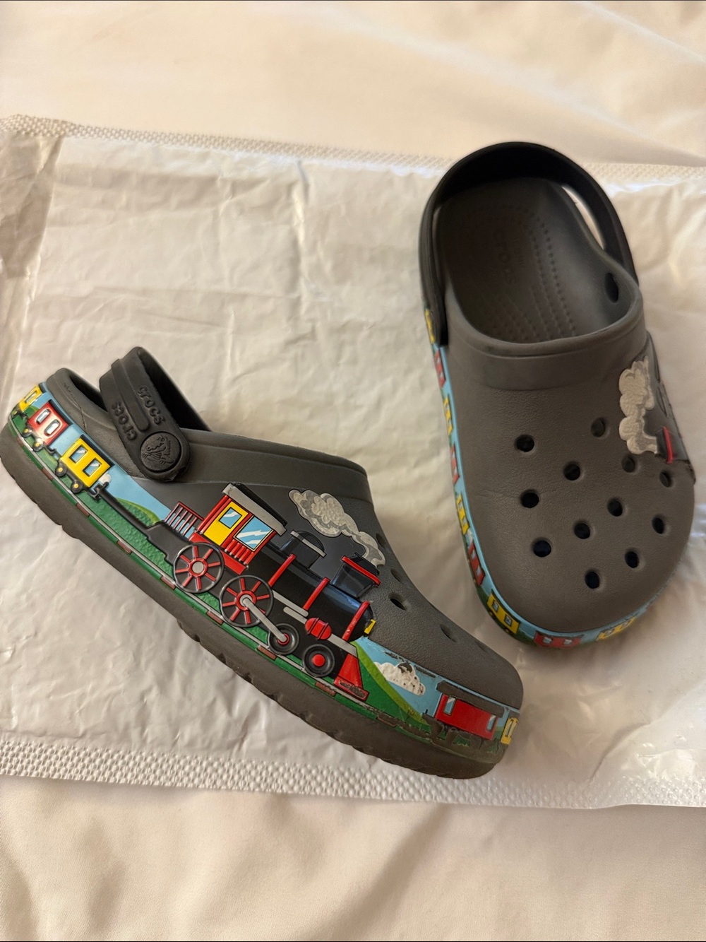 CROCS Kids' Clogs in Gray with Colorful Train Graphics, C12